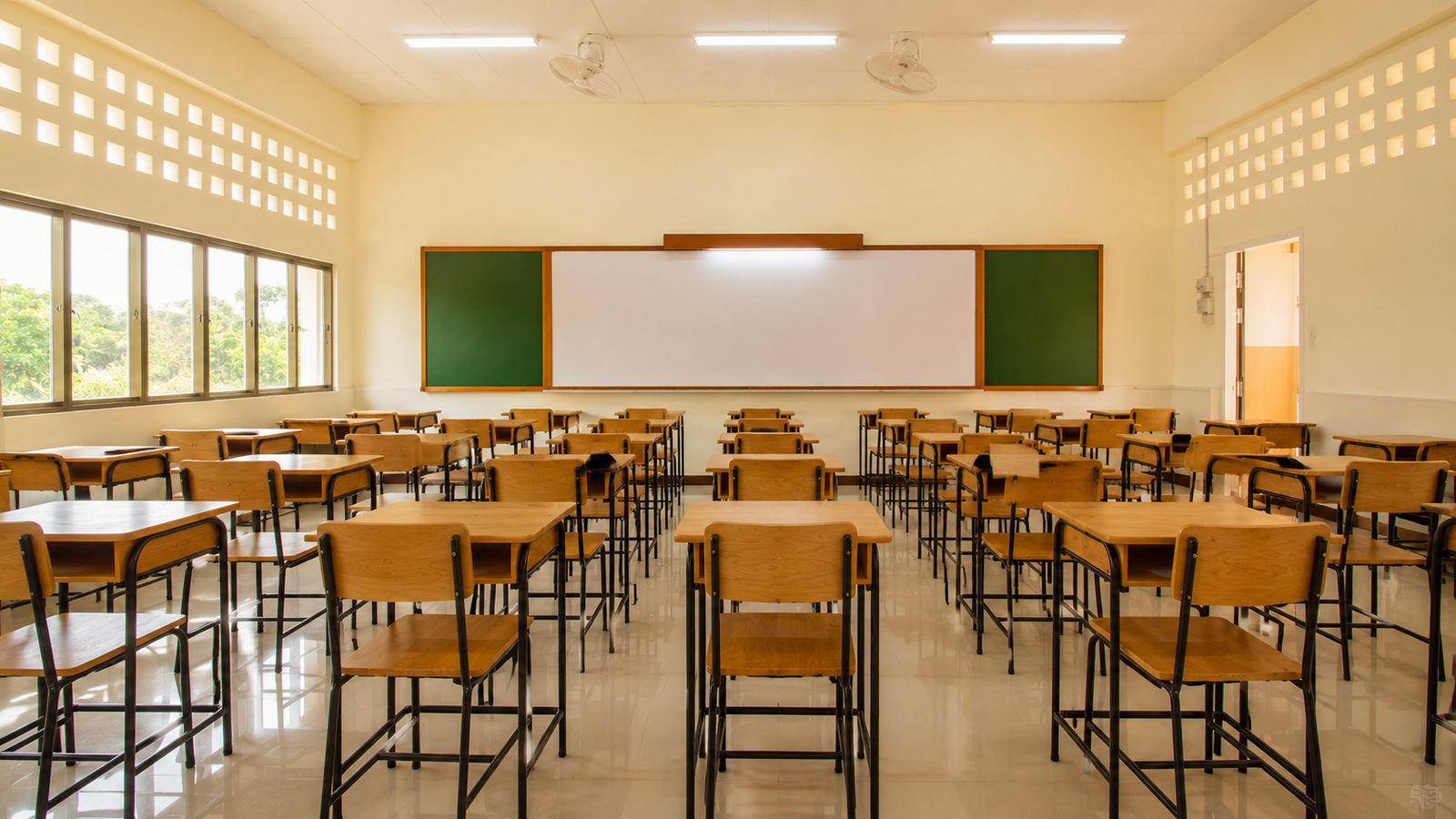 CSK Institute classroom with rows of desks facing the whiteboard, ready for live training sessions